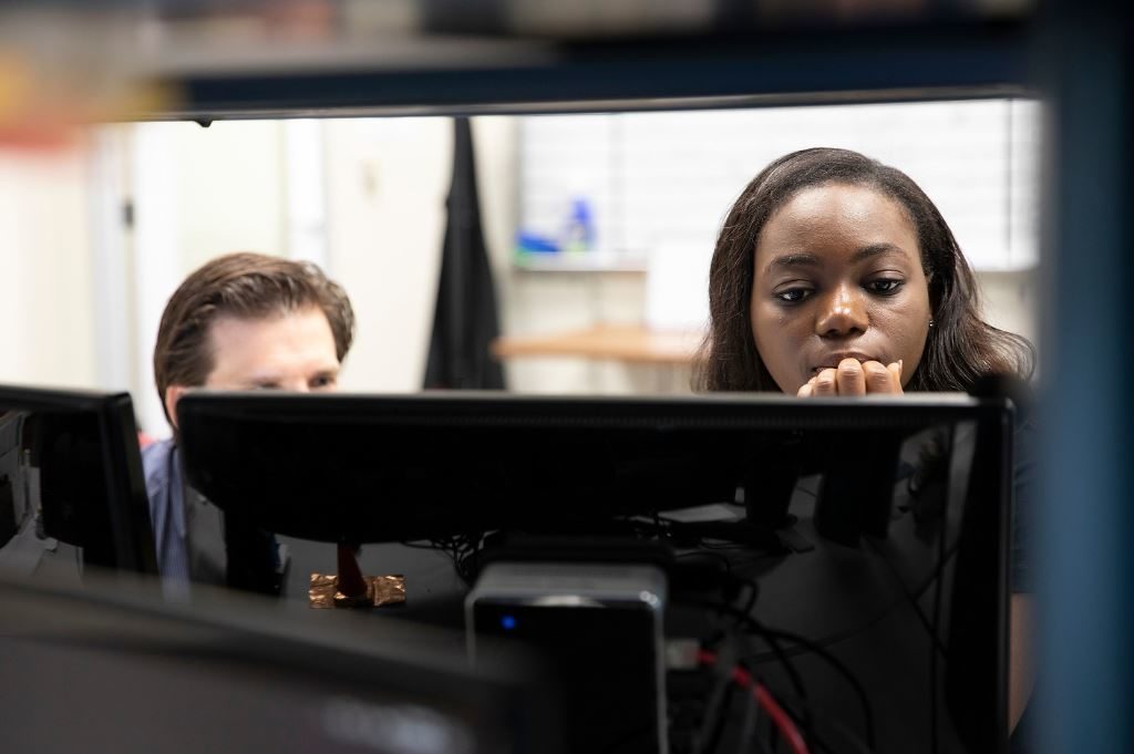 two students in computer lab