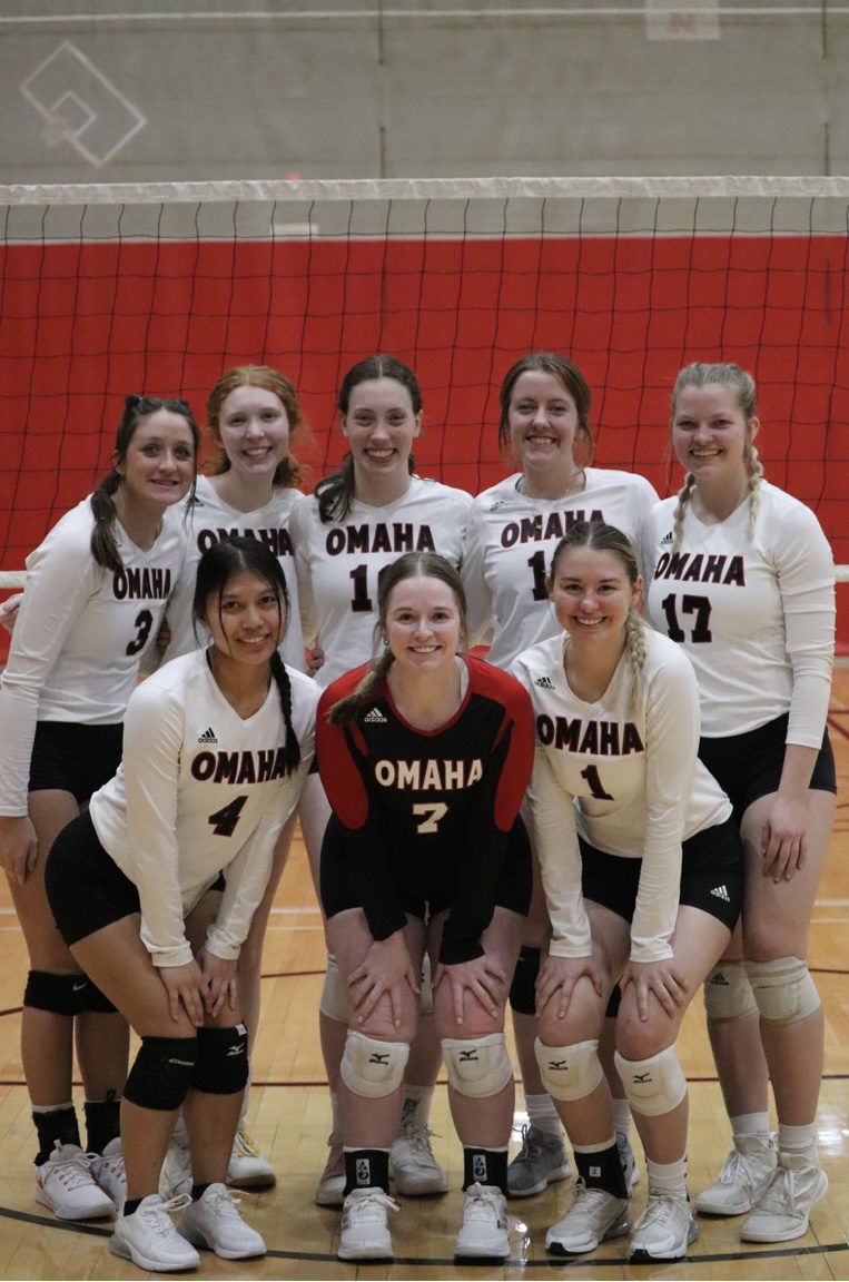 Kaitlyn Lorenzen (back right) poses with her teammates on the University of Nebraska Omaha Club Volleyball Team.