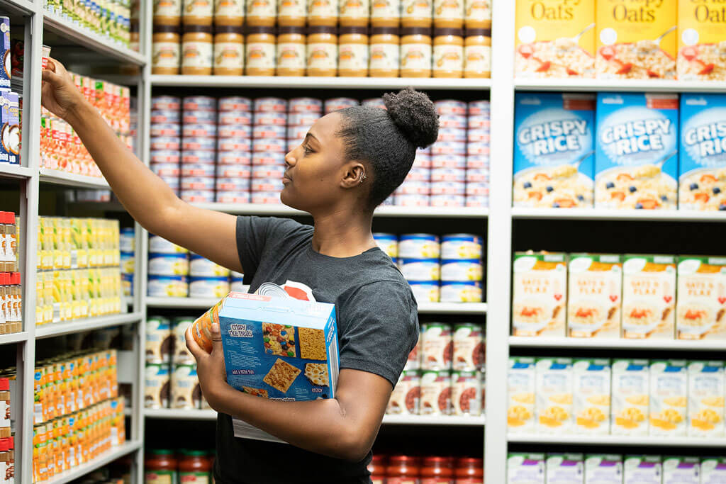student at mav food pantry